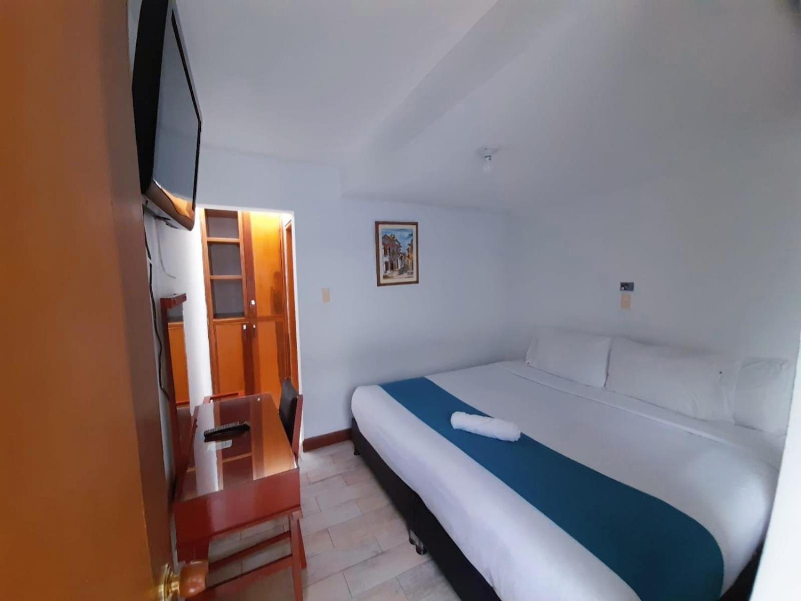 Hotel El Cid Plaza Premium Tunja Szoba fotó